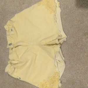 Girls yellow jean shorts with flowers size 10-12